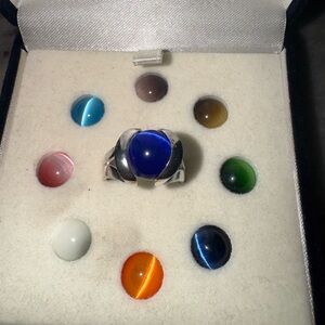 Silver Ring with 9 interchangeable stones on a size 7 ring.
